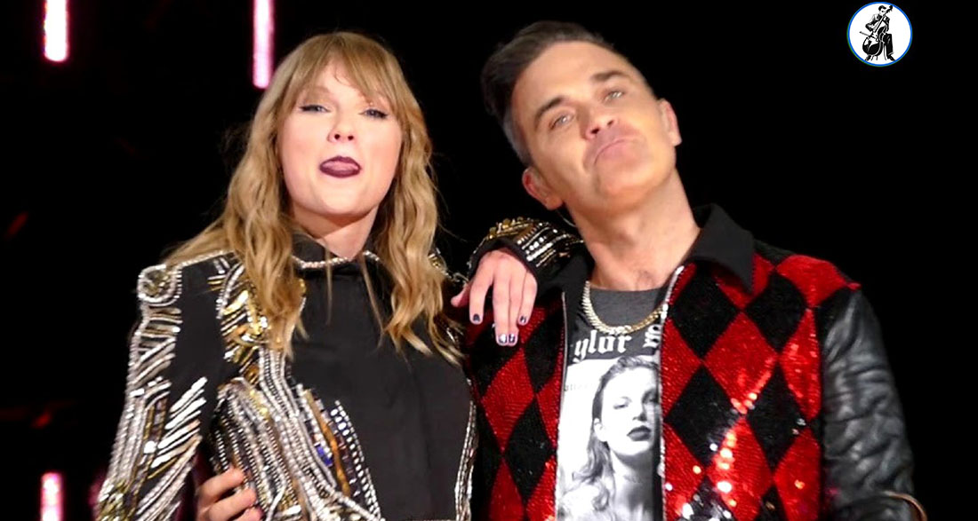 Robbie Williams & Taylor Swift have major chemistry on “Angels” live at Wembley